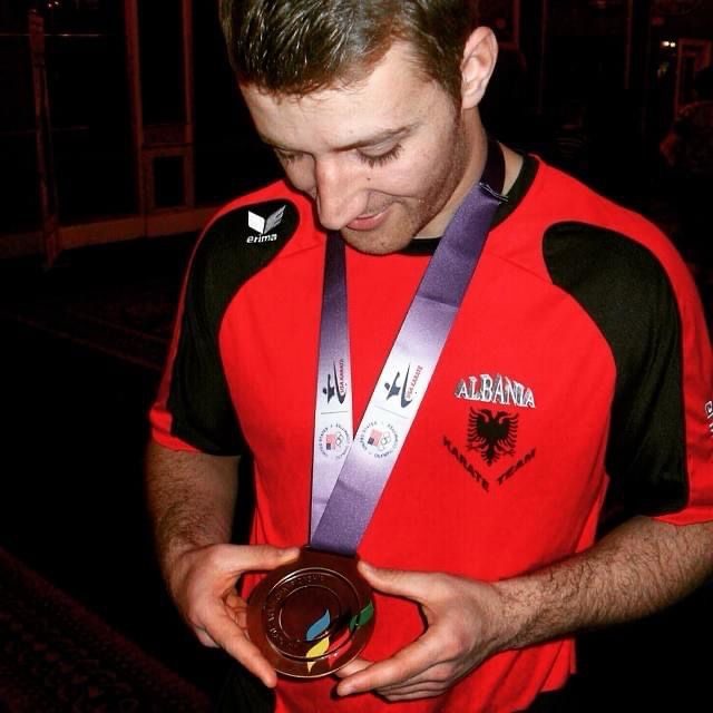 Adrian Hadribeaj with Albania Karate Team medal